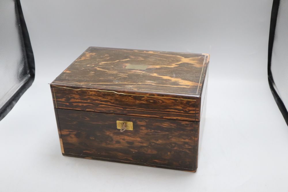 A 19th century brass inlaid coromandel wood travelling toilet box, with plate mounted interior, height 17cm width 28cm